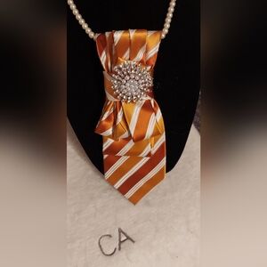 Orange and White Striped Tie with Brooch